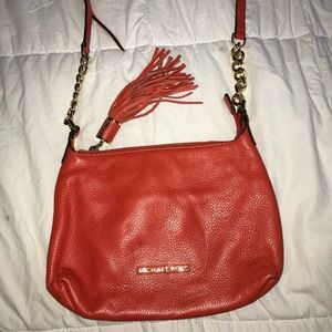red michael kors bag